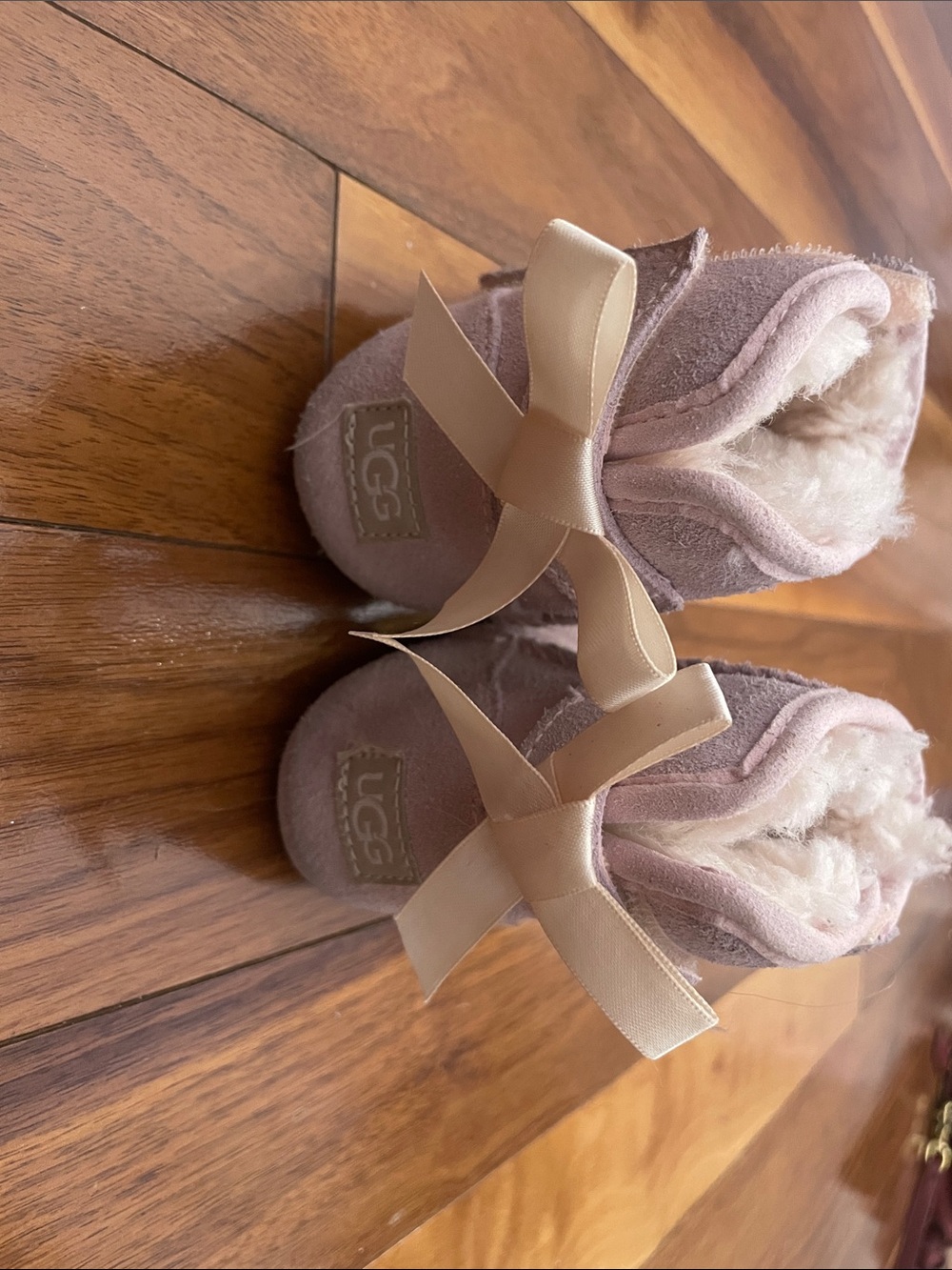 UGG Kids Blush Pink Sheepskin Booties with Satin Bows